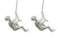 Set of Two Silver Resin Climbing Man Hanging Dimensional Sculpture on a white background
