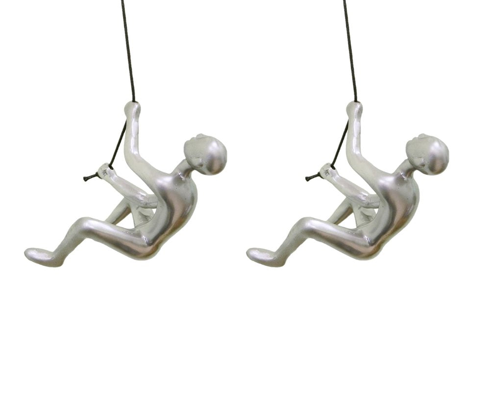 Set of Two Silver Resin Climbing Man Hanging Dimensional Sculpture on a white background