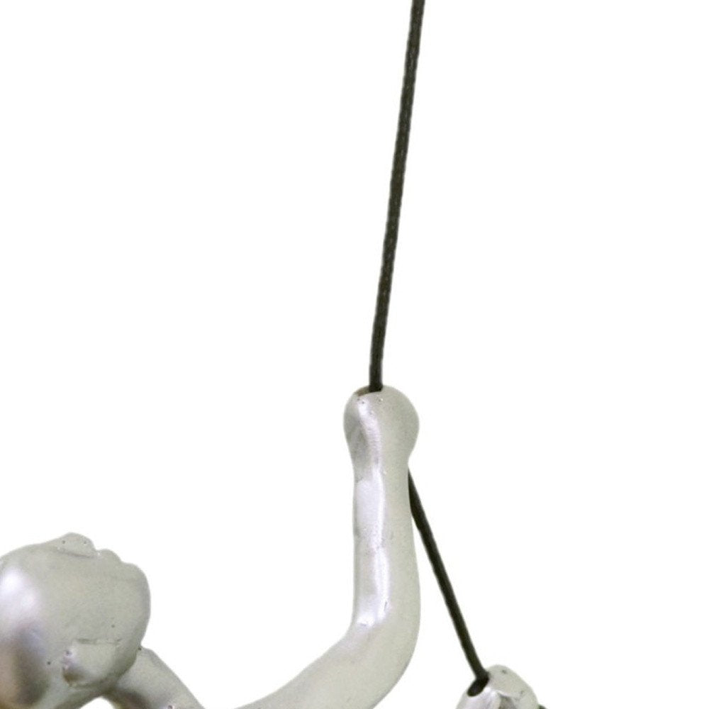 Set of Two Silver Resin Climbing Man Hanging Dimensional Sculpture on a white background