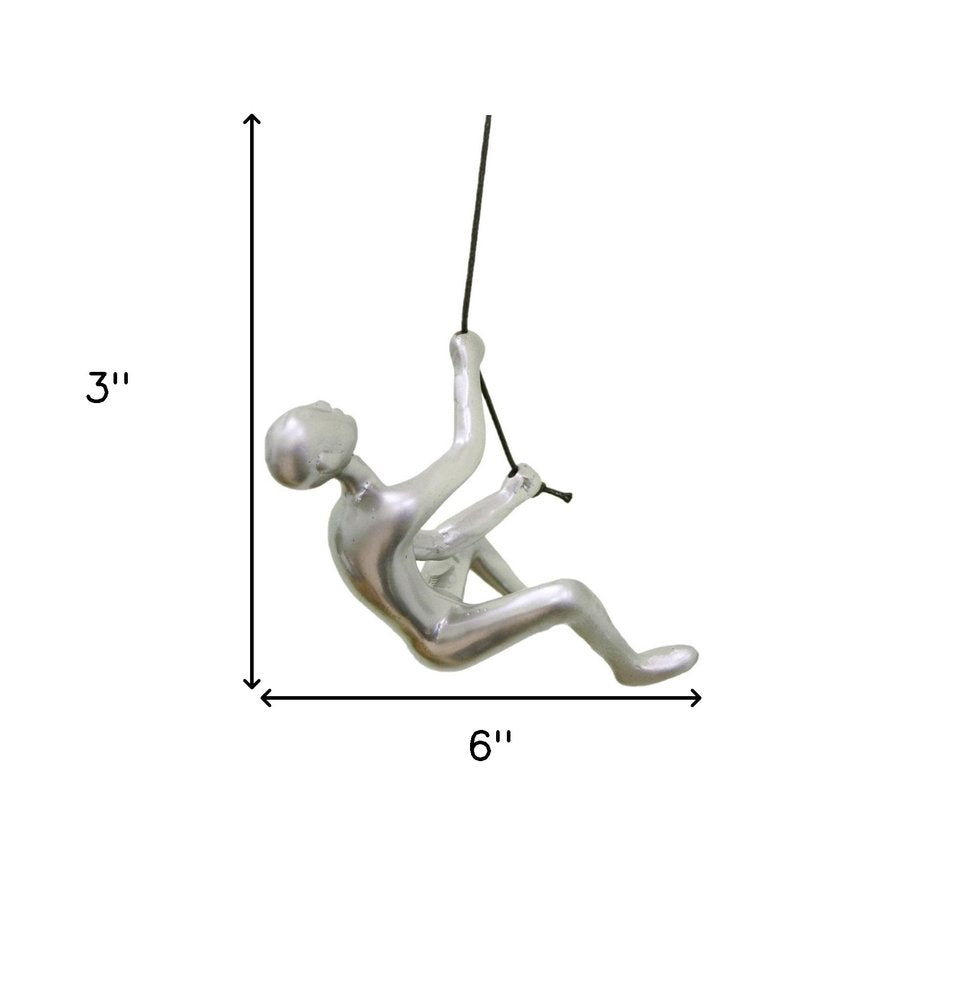 Set of Two Silver Resin Climbing Man Hanging Dimensional Sculpture on a white background
