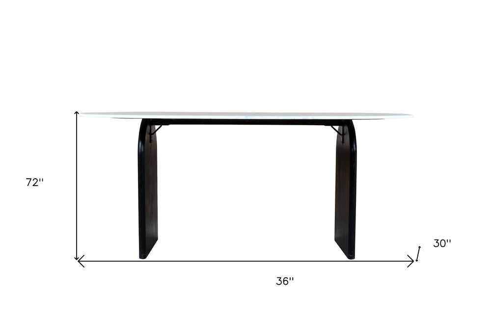 72" White and Black Marble And Solid Wood Sled Base Oval Dining Table on a white background