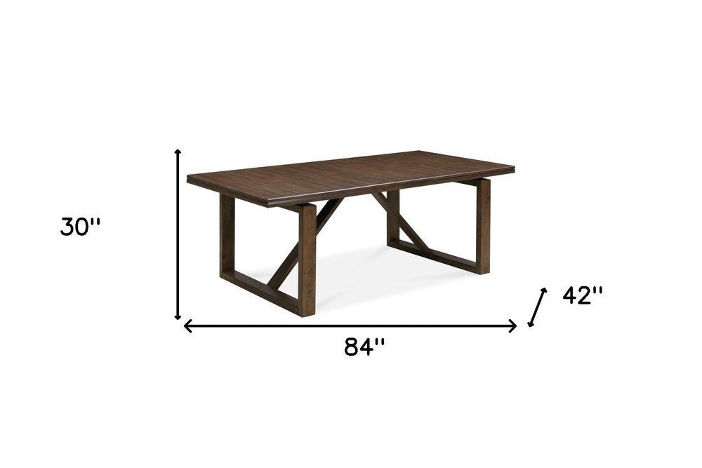 84" Dark Brown Wood Sled Base Dining Table on a white background