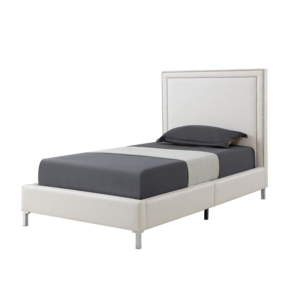 White upholstered faux leather twin bed frame with nailhead trim and silver legs on a white background.
