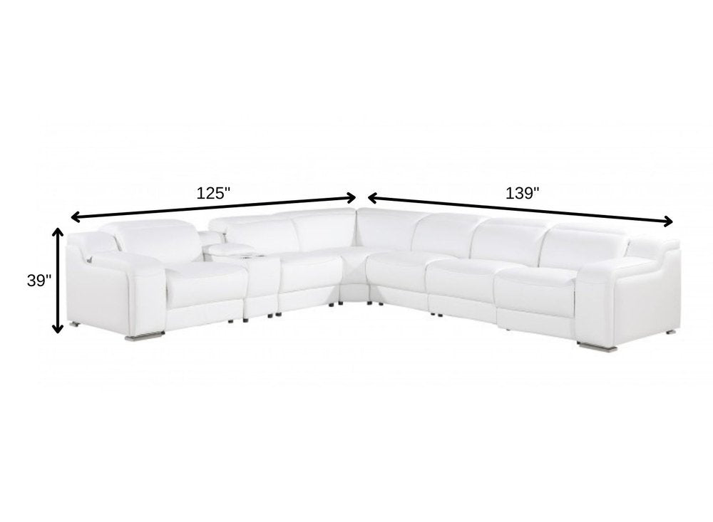 White Italian leather 3 power reclining seats L shaped Seven Piece Corner Sectional With Console on a white background