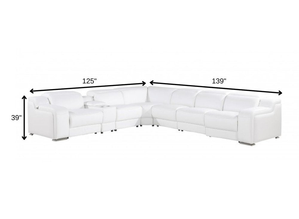 White Italian leather 4 power reclining seats L shaped Seven Piece Corner Sectional With Console on a white background
