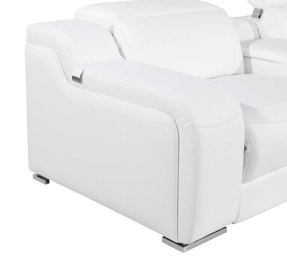 Close-up of a white Italian leather L-shaped sectional sofa with chrome feet, showing the armrest and stitching.