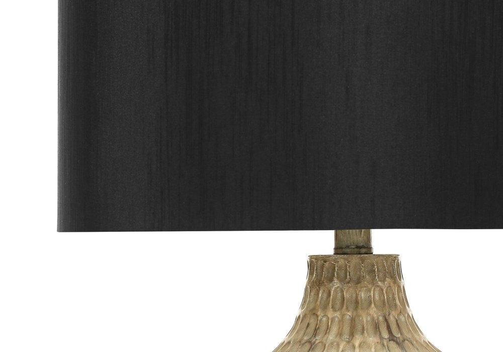25" Brown Geometric Table Lamp With Black Drum Shade. Table lamp isolated on a plain white background, showing its black color.