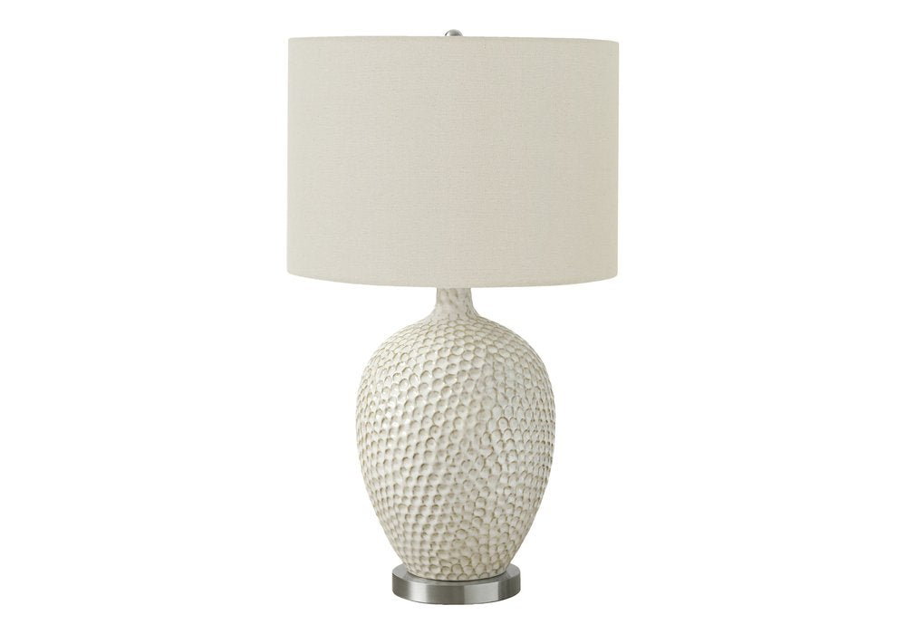 28" White and Silver Ceramic Round Table Lamp With Cream Drum Shade. Table lamp isolated on a plain white background, finished in cream ceramic.