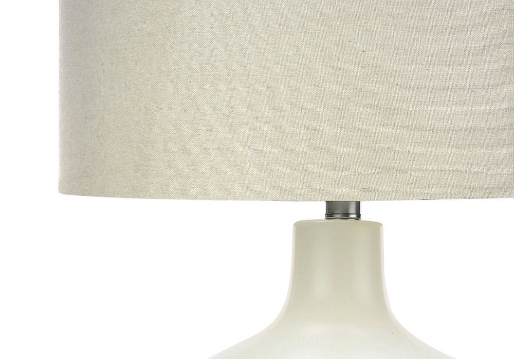 25" Cream Ceramic Gourd Table Lamp With Cream Drum Shade. Table lamp isolated on a plain white background, in a cream ceramic finish.