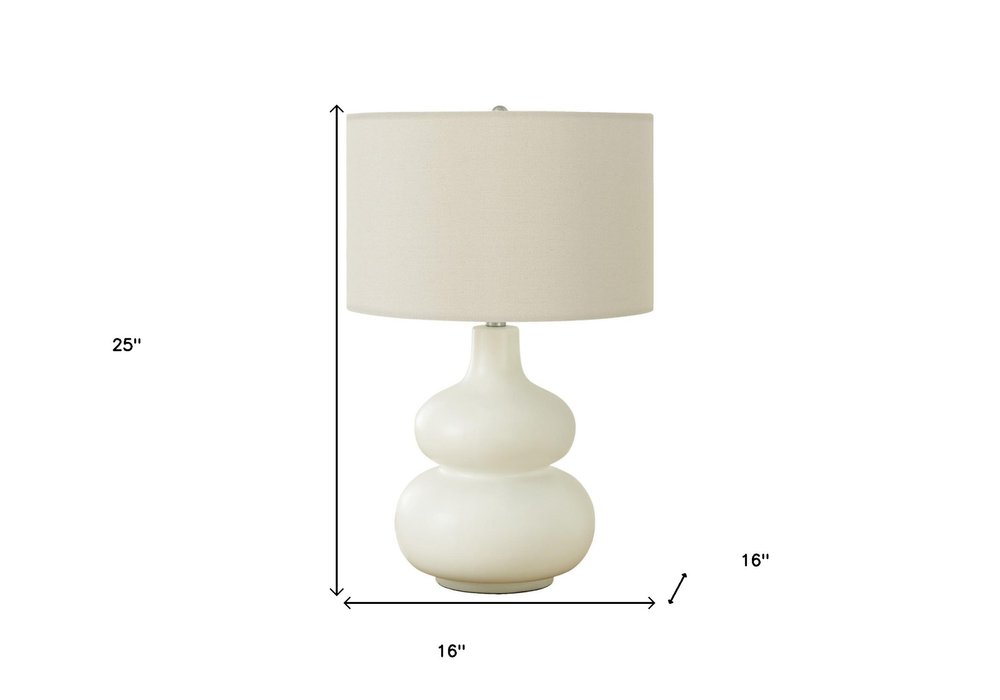 25" Cream Ceramic Gourd Table Lamp With Cream Drum Shade. Table lamp isolated on a plain white background, in a cream ceramic finish.