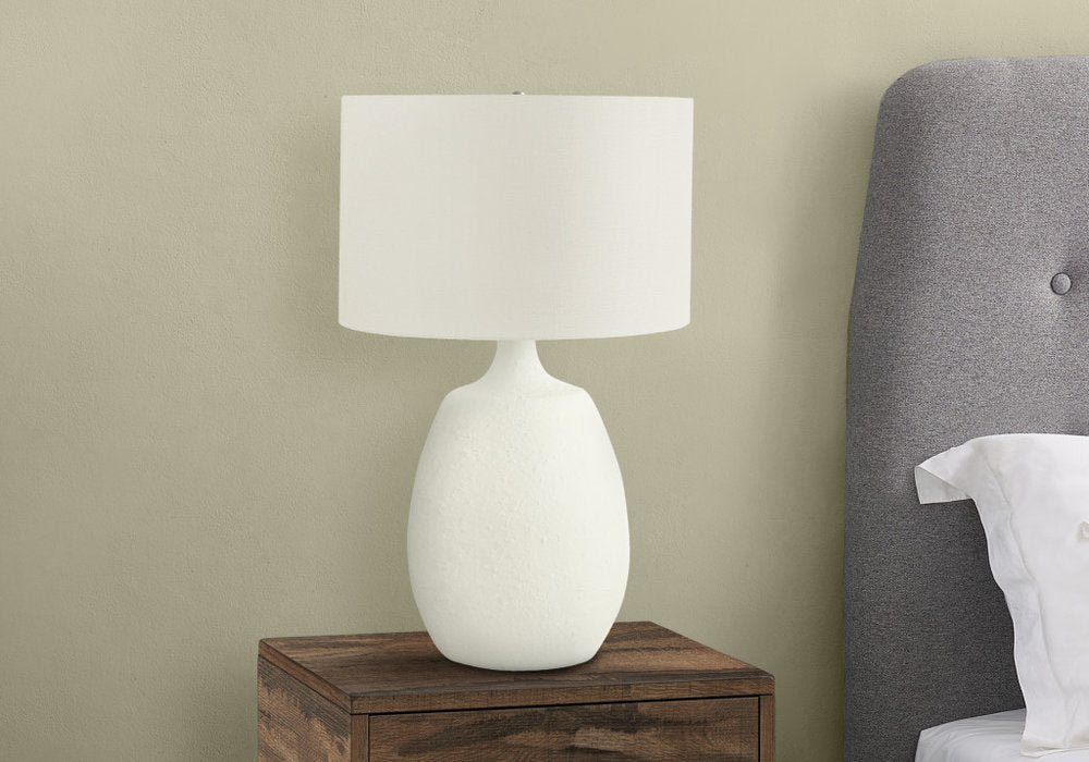 26" Cream Gourd Table Lamp With Cream Drum Shade. Table lamp in cream.