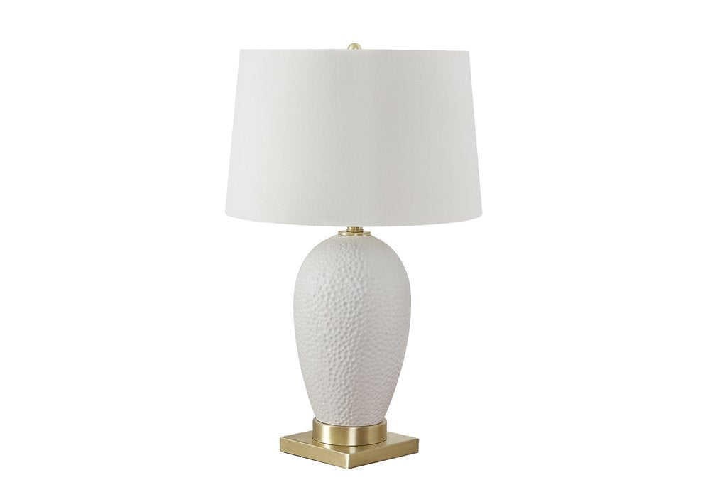 26" Gold and White Ceramic Urn Table Lamp With Cream Empire Shade. Table lamp isolated on a plain white background, in a cream ceramic finish.