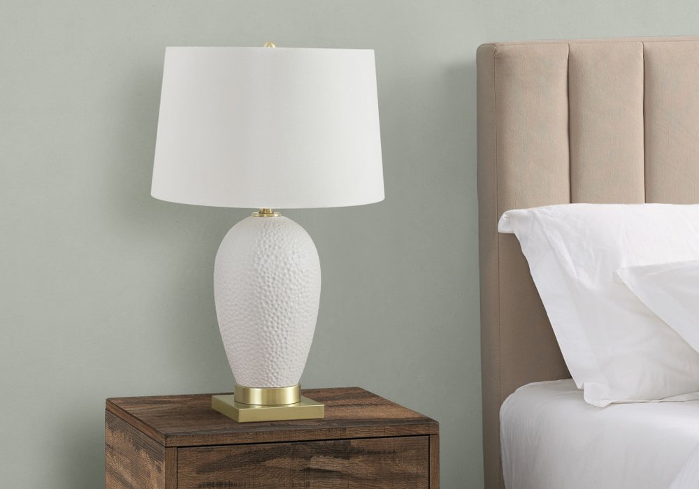 26" Gold and White Ceramic Urn Table Lamp With Cream Empire Shade. Table lamp isolated on a plain white background, finished in cream ceramic.