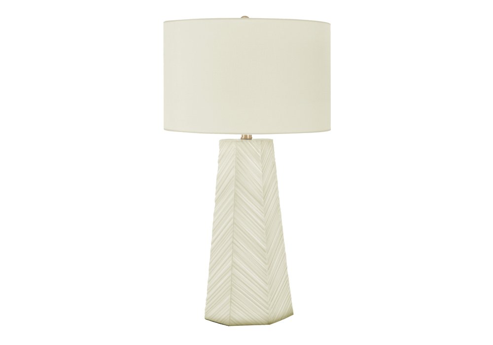 29" White Ceramic Geometric Table Lamp With Ivory Drum Shade. Table lamp isolated on a plain white background, showing a ivory ceramic surface.