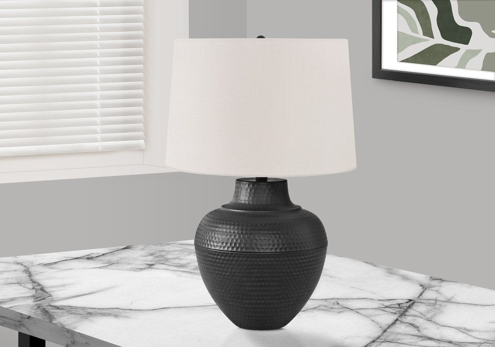 26" Black Metal Urn Table Lamp With Cream Empire Shade close-up highlighting the cream metal surface.