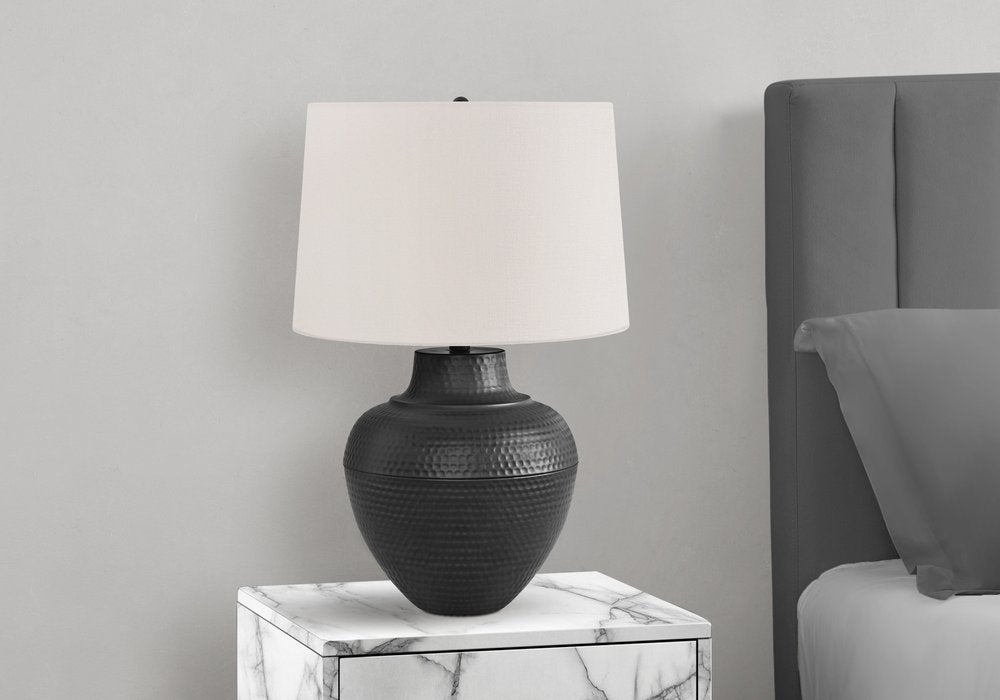 26" Black Metal Urn Table Lamp With Cream Empire Shade. Table lamp isolated on a plain white background, finished in cream metal.