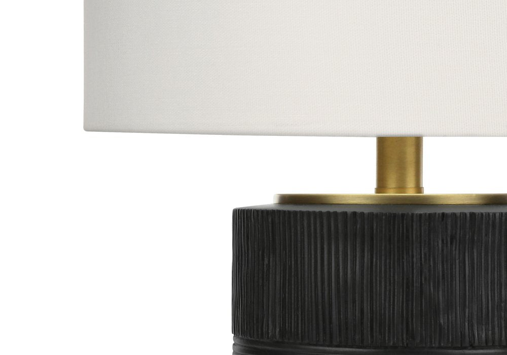 24" Black Cylinder Table Lamp With Ivory Drum Shade. Table lamp in ivory.