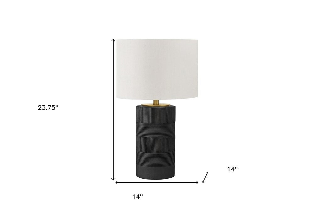 24" Black Cylinder Table Lamp With Ivory Drum Shade. Table lamp isolated on a plain white background, showing its ivory color.