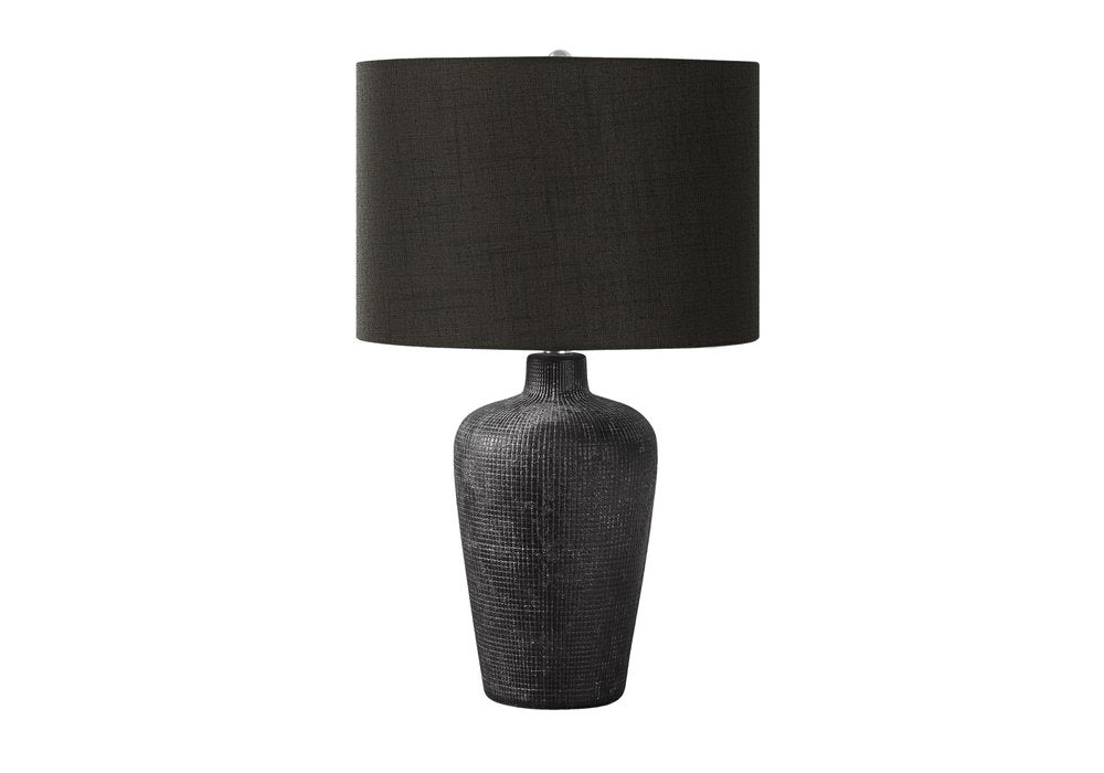 24" Black Ceramic Round Table Lamp With Black Drum Shade. Table lamp isolated on a plain white background, finished in black ceramic.