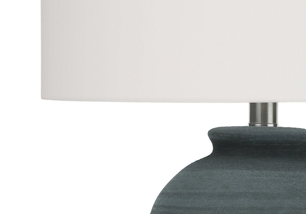 24" Blue and Silver Ceramic Round Table Lamp With Ivory Drum Shade. Table lamp in ivory ceramic.