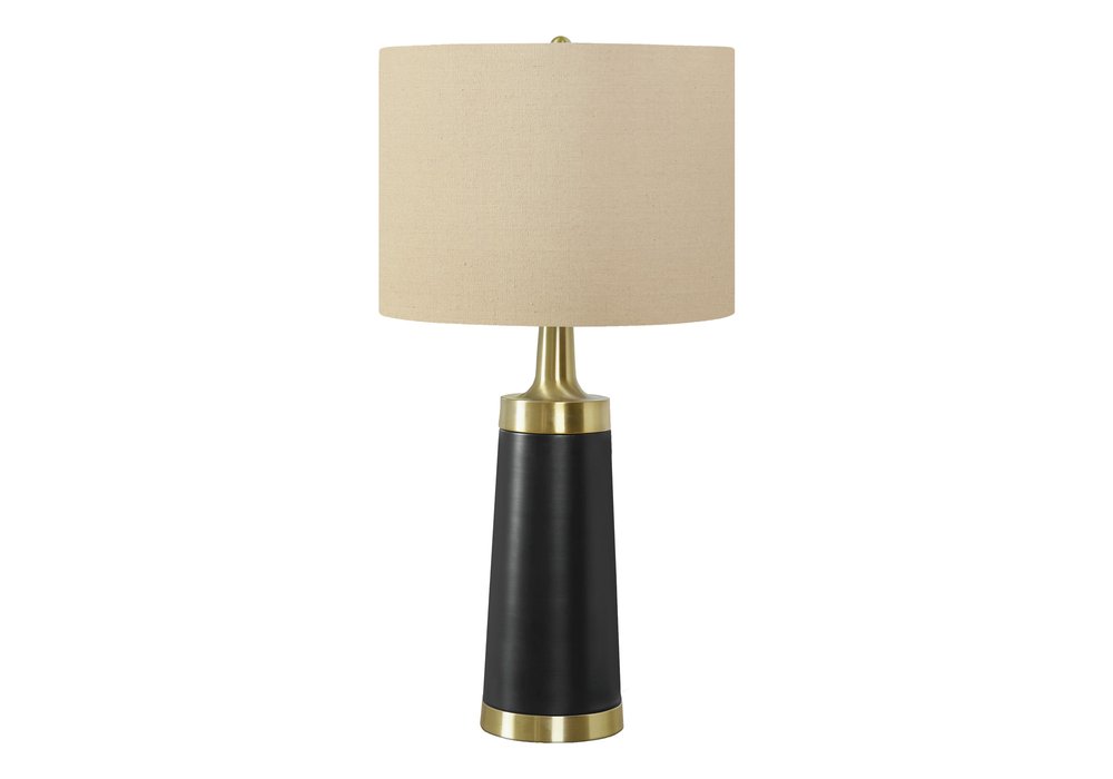 28" Black and Gold Metal Cylinder Table Lamp With Beige Drum Shade. Table lamp isolated on a plain white background, showing a beige metal surface.
