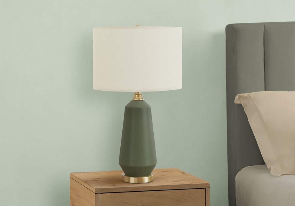 26" Green Ceramic Geometric Table Lamp With Ivory Drum Shade. Table lamp isolated on a plain white background, showing a ivory ceramic surface.