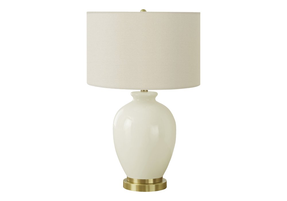 26" Gold and Ivory Ceramic Urn Table Lamp With Cream Drum Shade. Table lamp isolated on a plain white background, finished in ivory ceramic.
