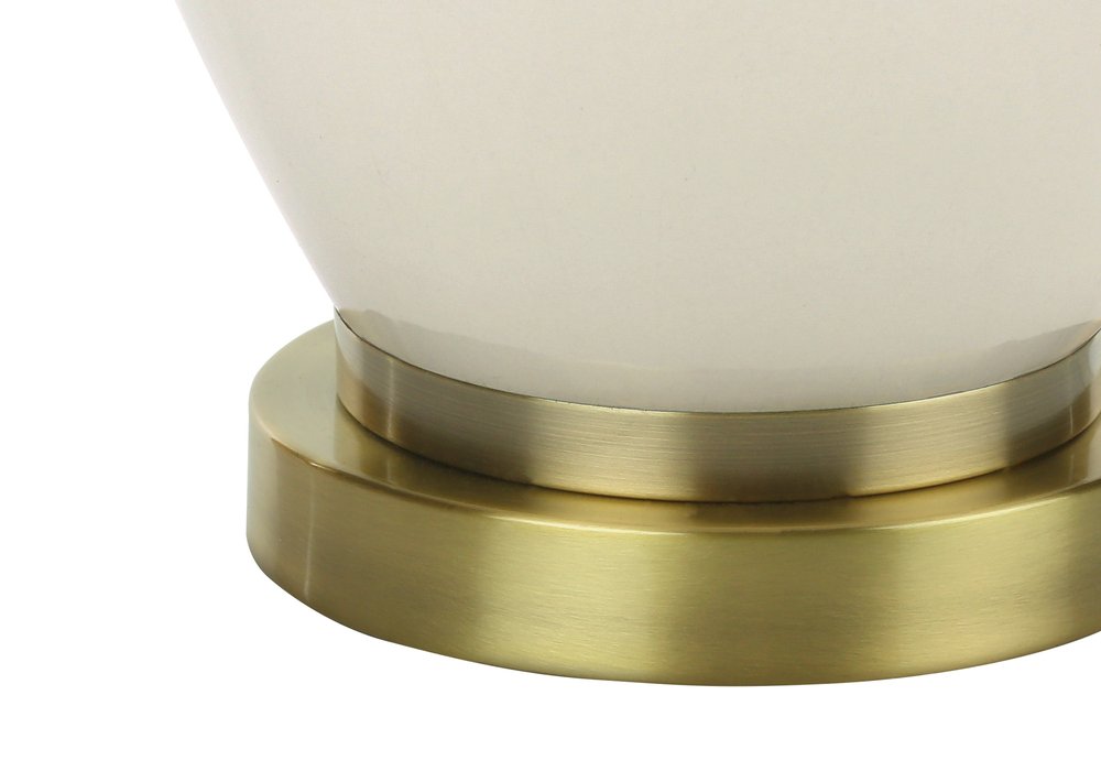 26" Gold and Ivory Ceramic Urn Table Lamp With Cream Drum Shade. Table lamp isolated on a plain white background, in a ivory ceramic finish.