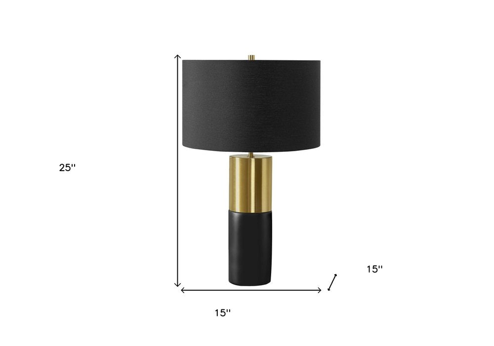 25" Black and Gold Concrete Cylinder Table Lamp With Black Drum Shade. Table lamp isolated on a plain white background, in a black finish.