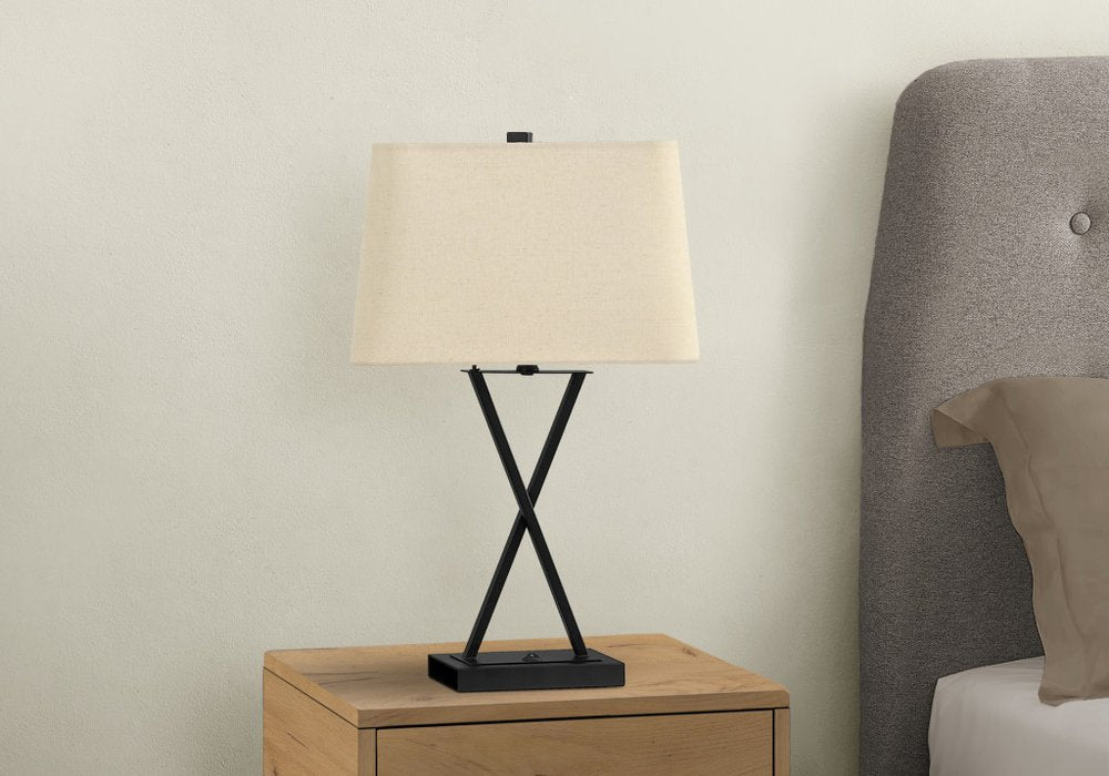 25" Black Metal Geometric USB Table Lamp With Beige Shade. Table lamp isolated on a plain white background, finished in beige metal.