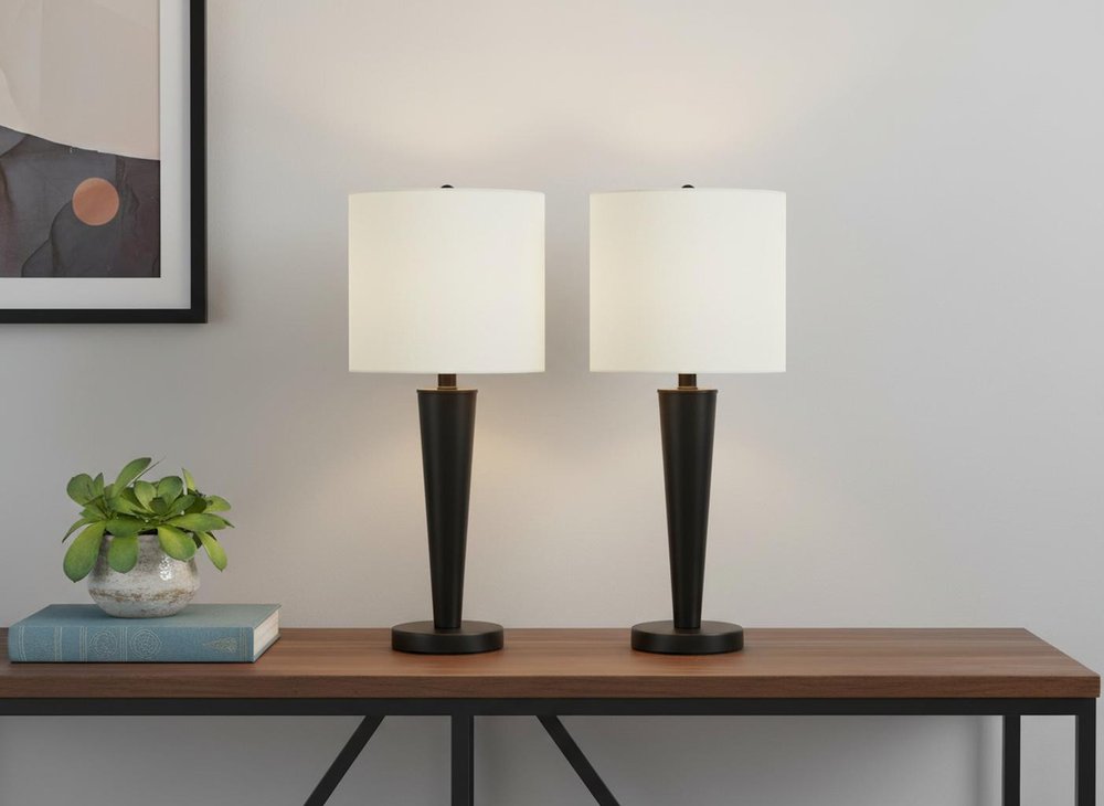 Set of Two 24" Black Metal Candlestick USB Table Lamps With Ivory Drum Shade in a home interior