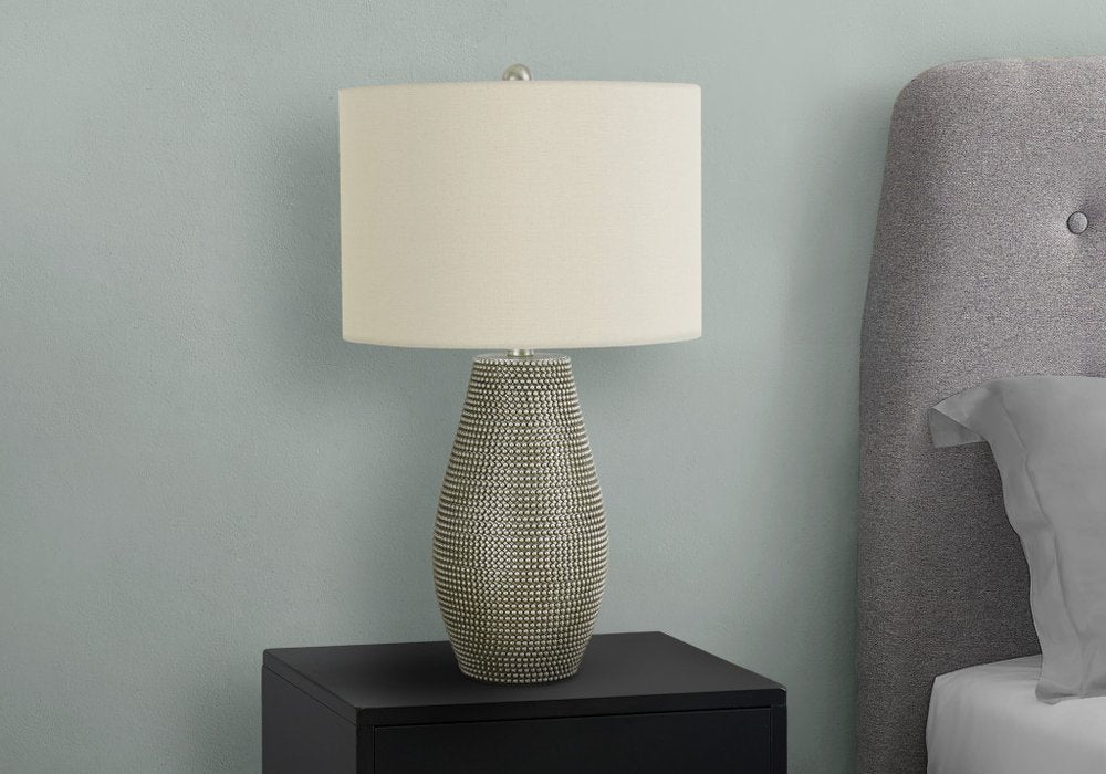 24" Gray Round Table Lamp With Ivory Drum Shade close-up highlighting the gray surface.