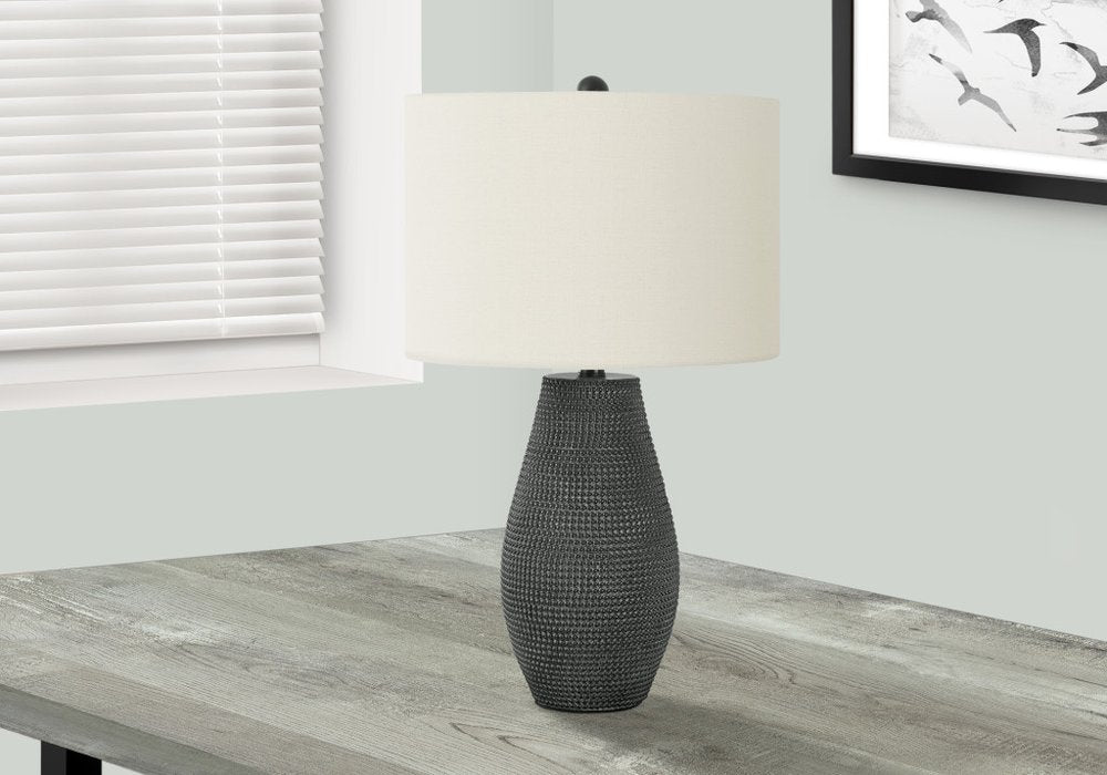 Detail view of 24" Black Round Table Lamp With Ivory Drum Shade, filling the frame with the ivory texture.