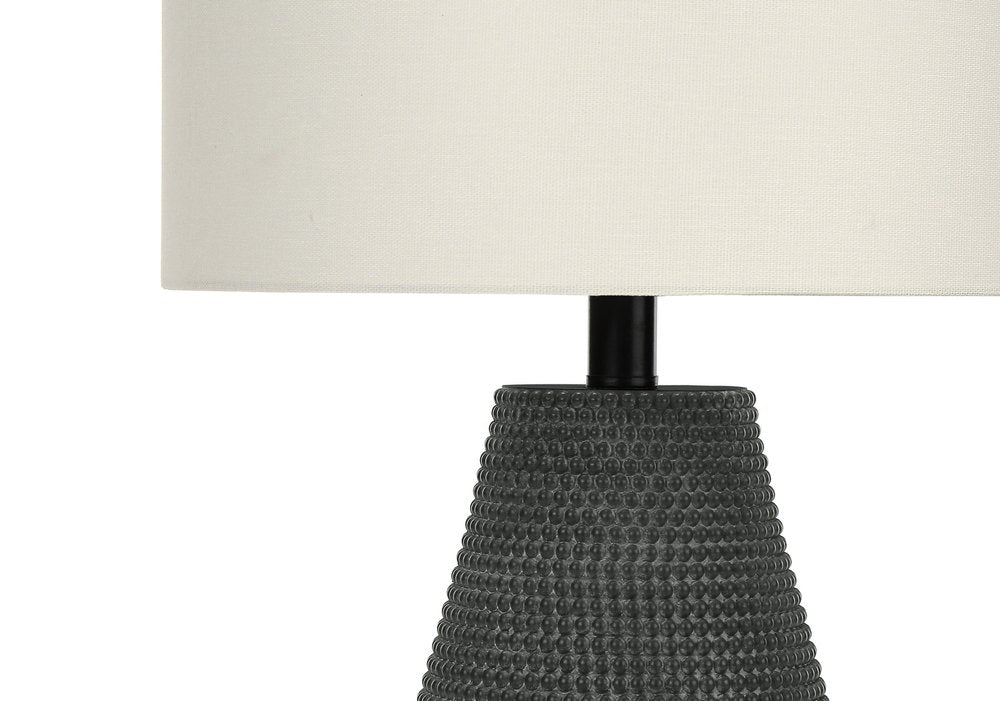 24" Black Round Table Lamp With Ivory Drum Shade. Table lamp isolated on a plain white background, showing its ivory color.
