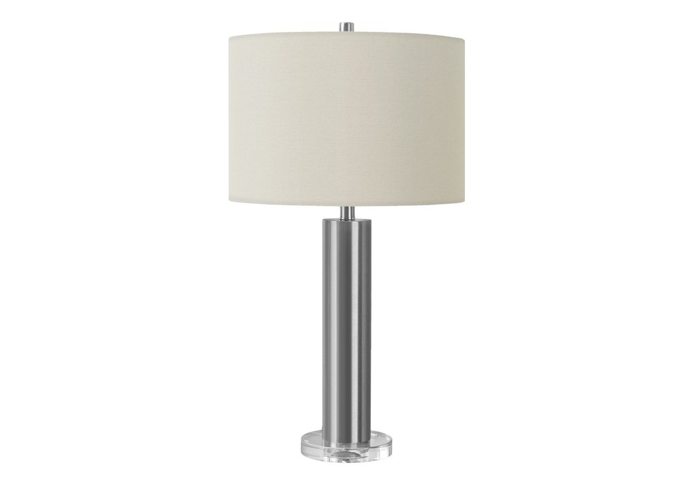 28" Silver Acrylic Cylinder Table Lamp With Ivory Drum Shade. Table lamp isolated on a plain white background, finished in ivory.