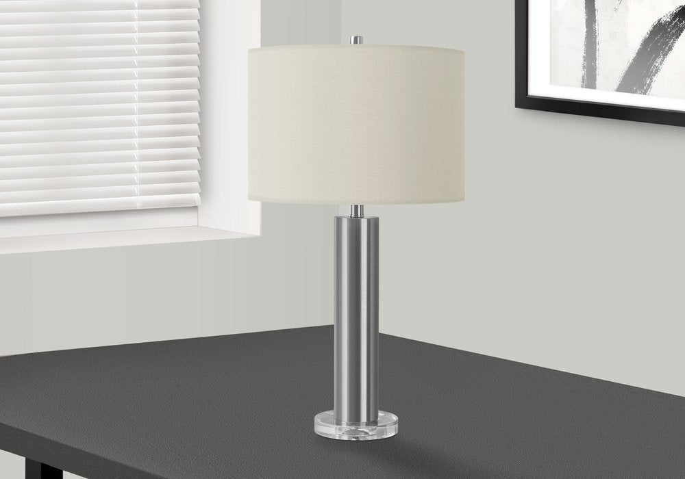 Close-up of 28" Silver Acrylic Cylinder Table Lamp With Ivory Drum Shade showing the ivory texture.