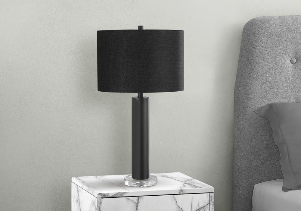 Close-up of 28" Black Metal and Acrylic Cylinder Table Lamp With Black Drum Shade showing the metal texture.