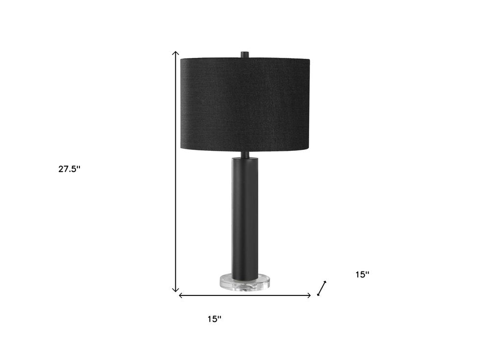28" Black Metal and Acrylic Cylinder Table Lamp With Black Drum Shade. Table lamp isolated on a plain white background, showing a black metal surface.