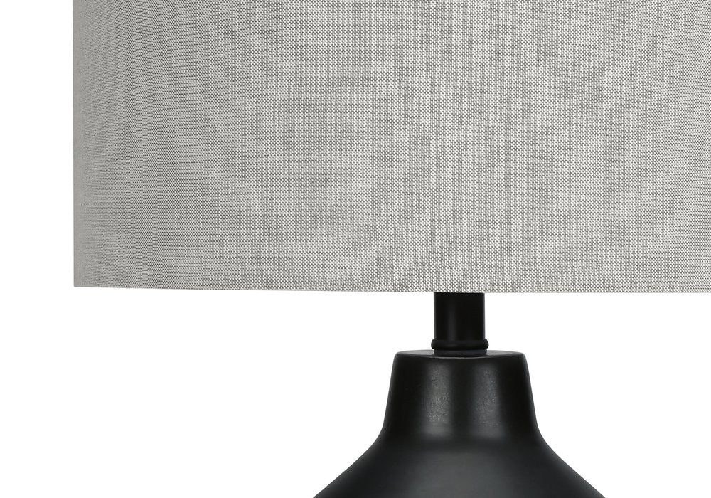 24" Black Concrete Urn Table Lamp With Gray Drum Shade. Table lamp in black.