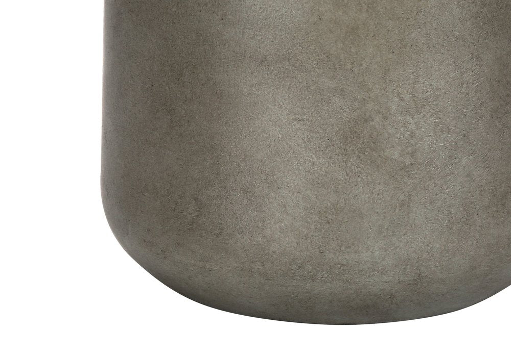 24" Gray Concrete Urn Table Lamp With Beige Drum Shade. Table lamp isolated on a plain white background, in a beige finish.