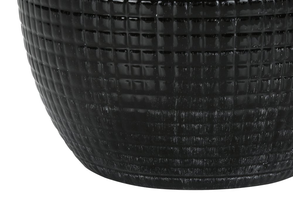 26" Black Ceramic Urn Table Lamp With Ivory Drum Shade. Table lamp isolated on a plain white background, showing a black ceramic surface.