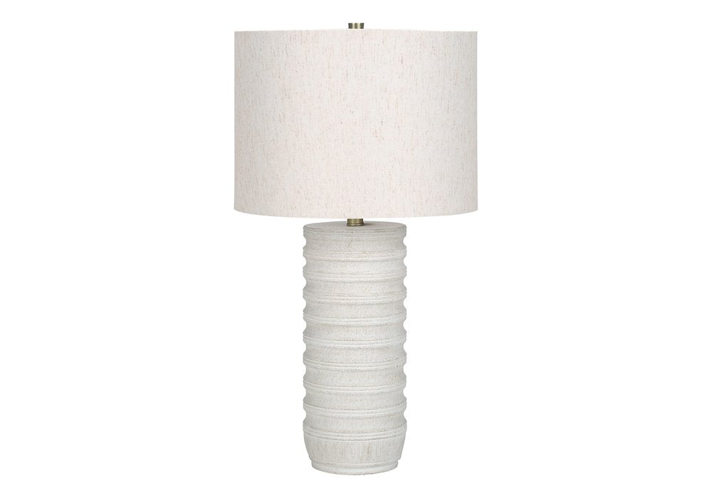 28" Cream Cylinder Table Lamp With Cream Drum Shade. Table lamp isolated on a plain white background, finished in cream.