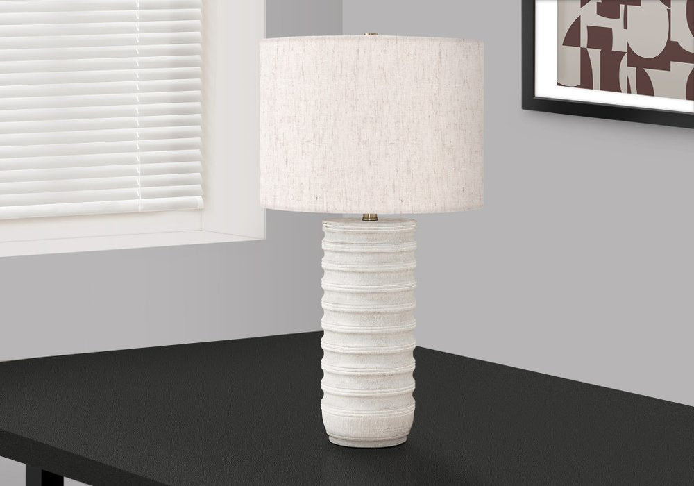 28" Cream Cylinder Table Lamp With Cream Drum Shade close-up highlighting the cream surface.