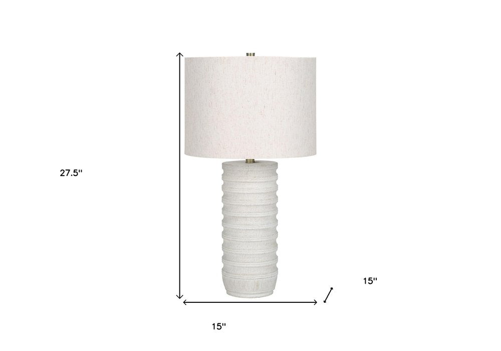 28" Cream Cylinder Table Lamp With Cream Drum Shade. Table lamp isolated on a plain white background, showing its cream color.