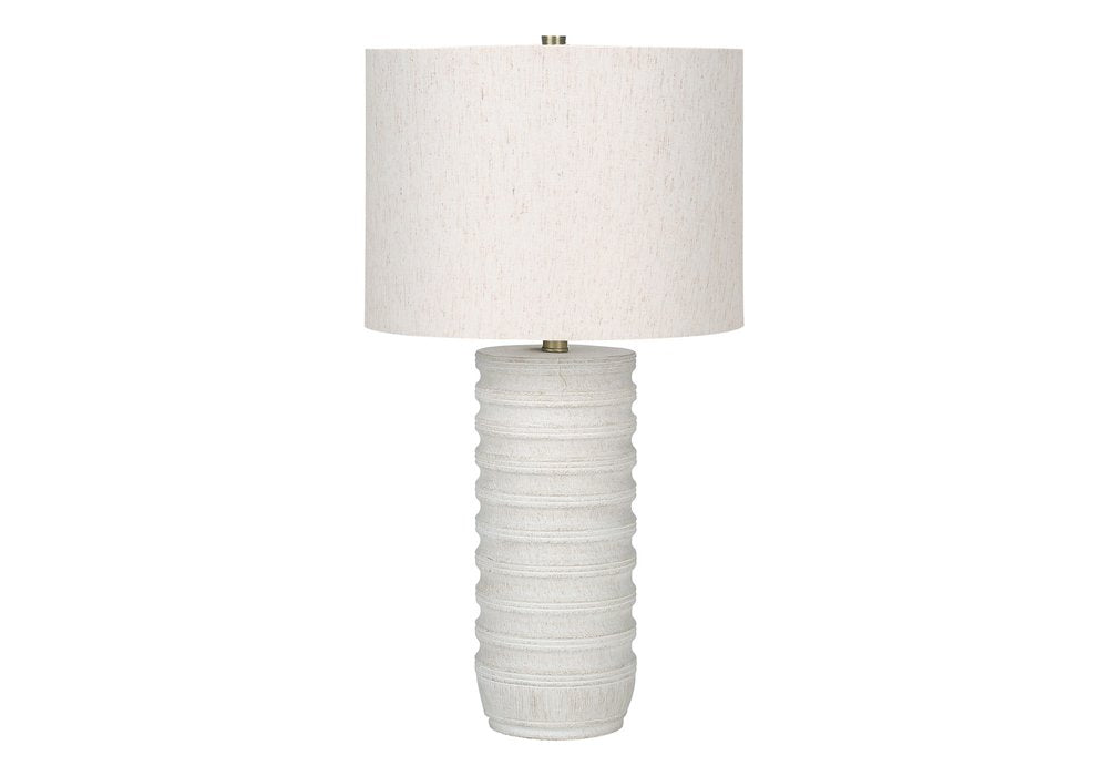 28" Cream Cylinder Table Lamp With Cream Drum Shade. Table lamp isolated on a plain white background, showing its cream color.