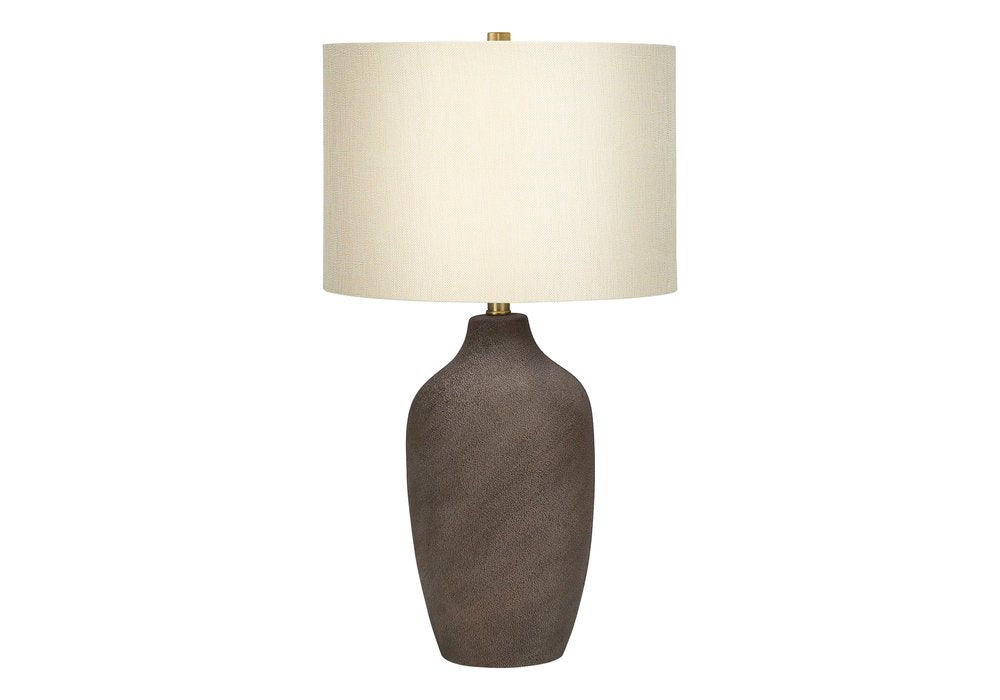 27" Gray Ceramic Urn Table Lamp With Beige Drum Shade. Table lamp isolated on a plain white background, finished in beige ceramic.