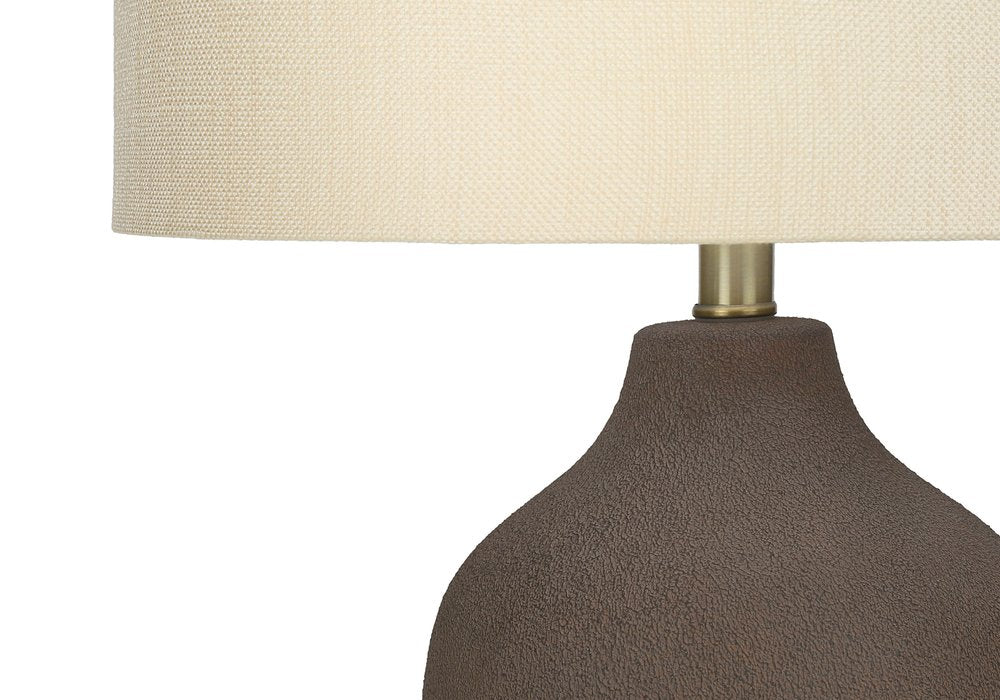 27" Gray Ceramic Urn Table Lamp With Beige Drum Shade. Table lamp in beige ceramic.