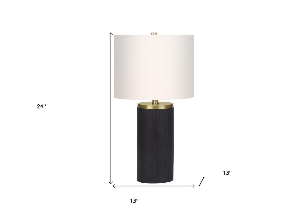 24" Black and Gold Concrete Cylinder Table Lamp With Ivory Drum Shade. Table lamp isolated on a plain white background, in a ivory finish.