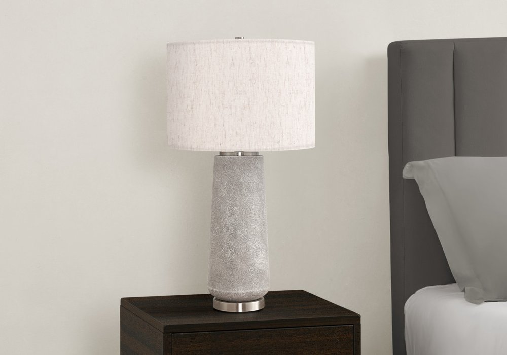 29" Gray and Silver Cylinder Table Lamp With Ivory Drum Shade close-up highlighting the ivory surface.