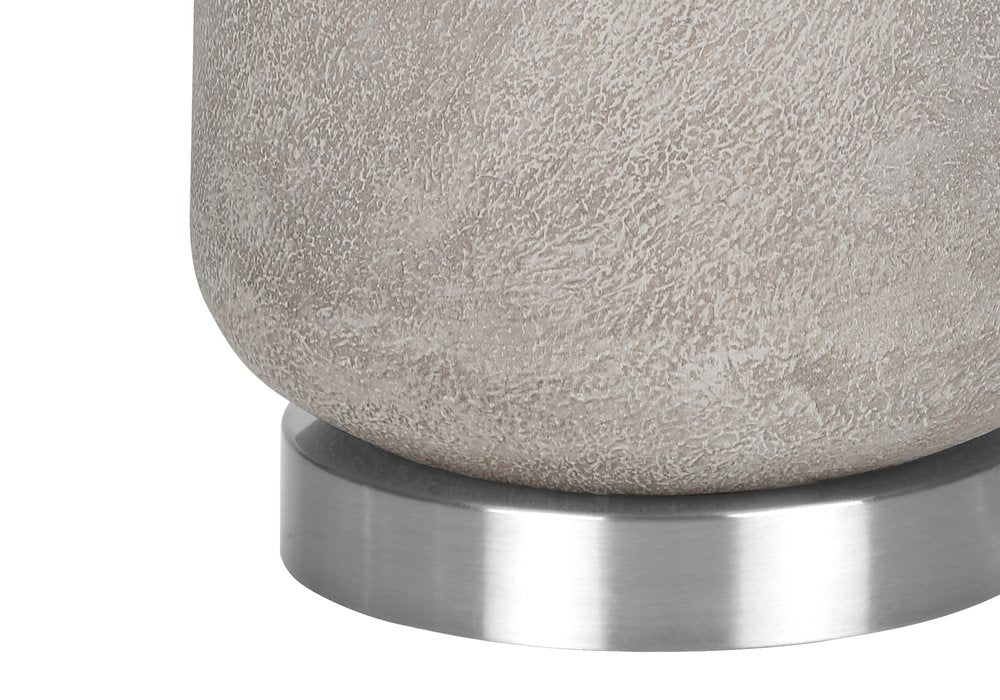 29" Gray and Silver Cylinder Table Lamp With Ivory Drum Shade. Table lamp isolated on a plain white background, finished in silver.